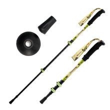 two kids trekking poles with mud basket and tip protector on white background