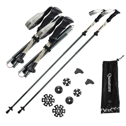 pair of collapsible hiking poles with full accessories set