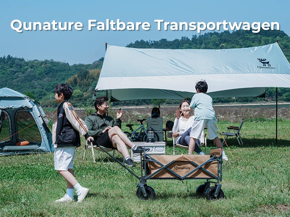 familie beim camping mit qunature faltbarem transportwagen auf einer wiese
