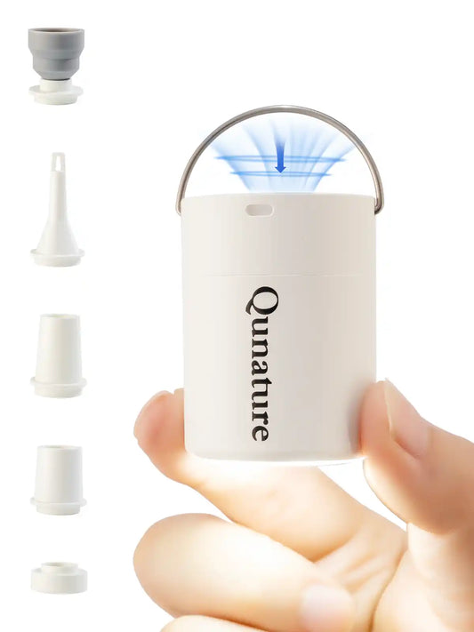 weisse mini-luftpumpe in der hand mit luftstrom
