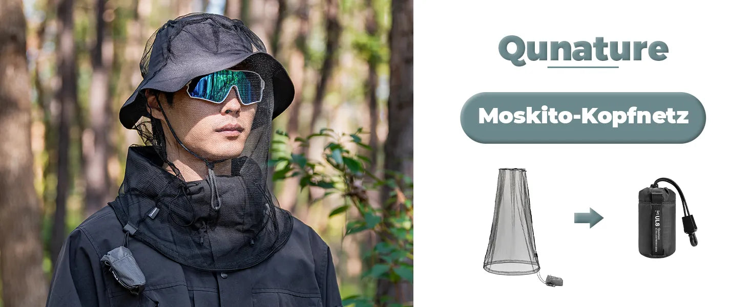 mann im wald mit moskitonetz und hut