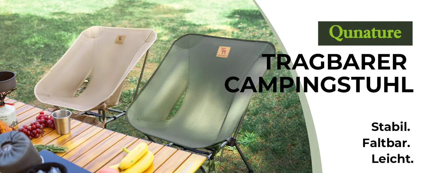 qunature campingstühle in beige und grün auf einer wiese mit camping-tisch und lebensmitteln