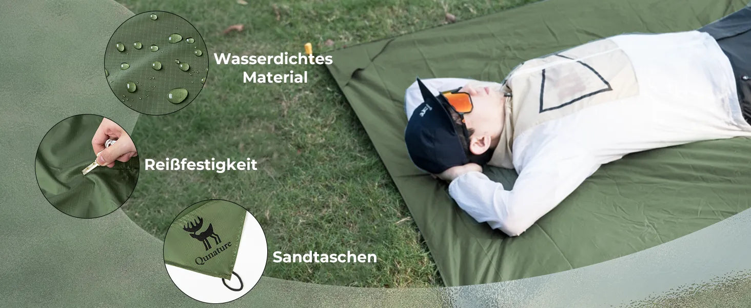 person liegt auf grüner picknickunterlage auf dem rasen, wasserdichtes material und reißfestigkeit