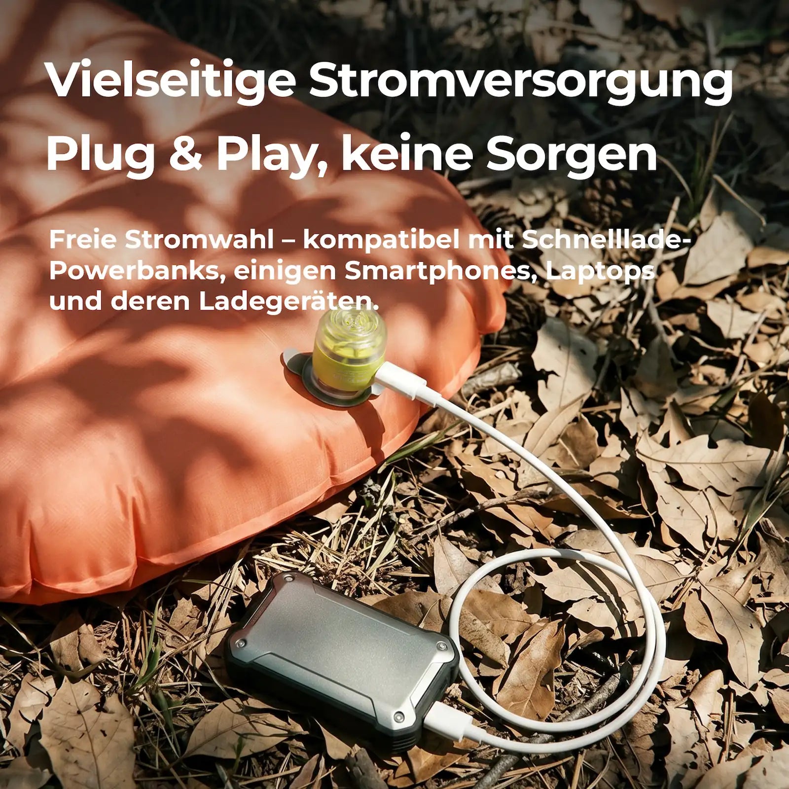 grüne mini-luftpumpe wird mit einer powerbank betrieben, zeigt die vielseitige stromversorgung