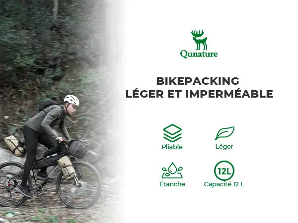 biker mit outdoor-taschen auf dem fahrrad in einer waldlandschaft